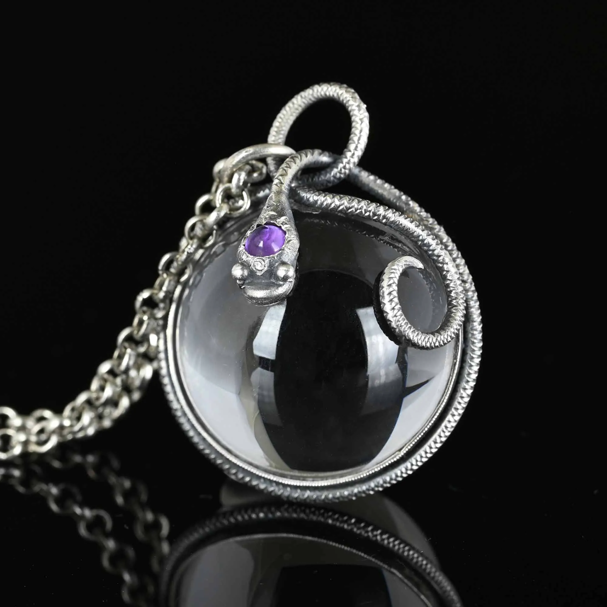 Amethyst Pools of Light Rock Crystal Snake Pendant